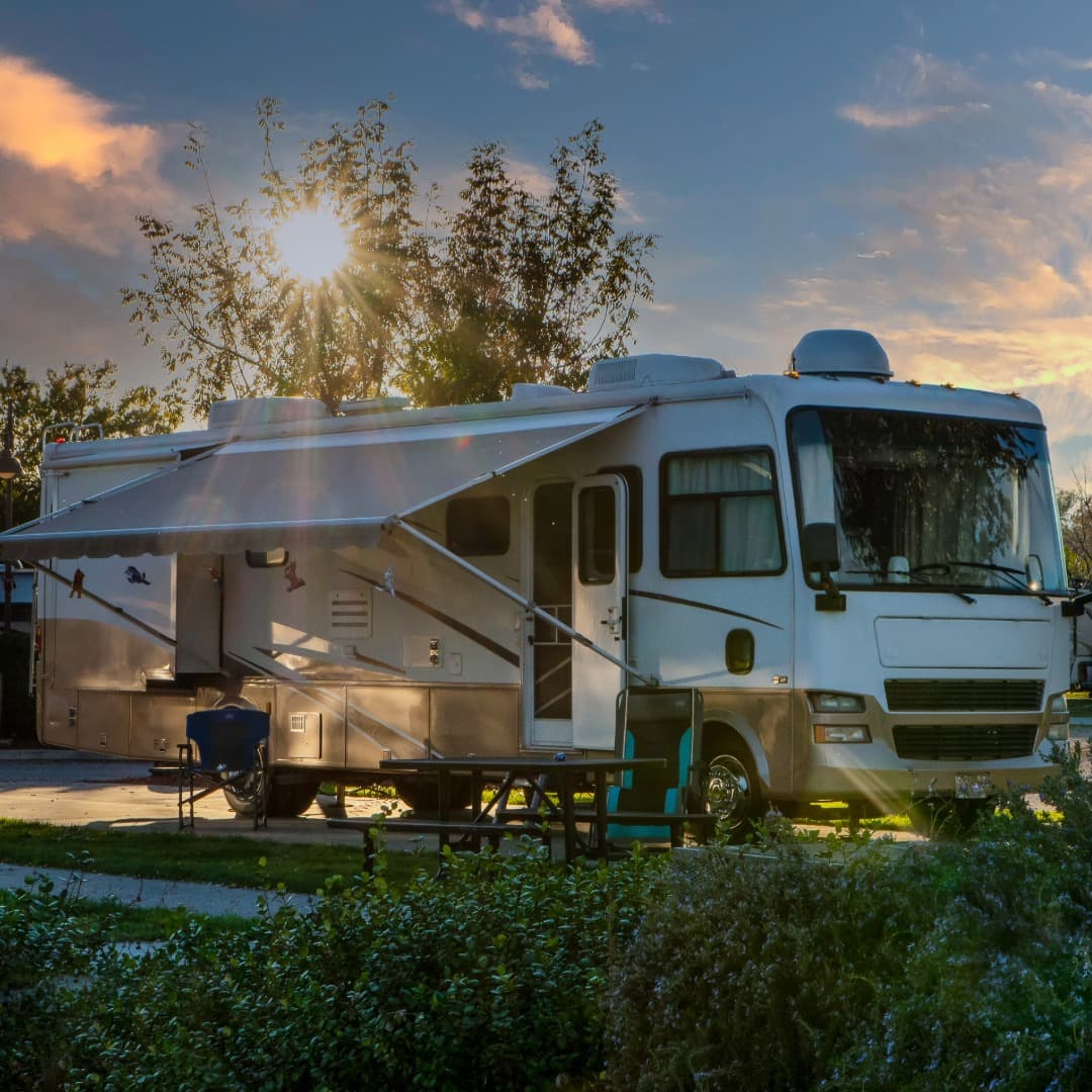 Motorized RV setup at sunset