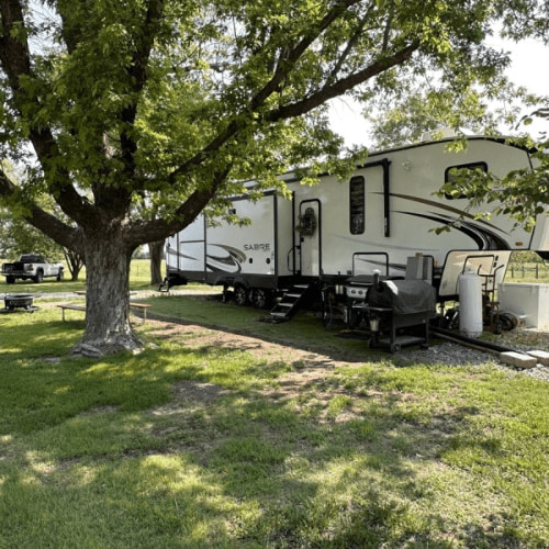 Towable RV set up in the summer