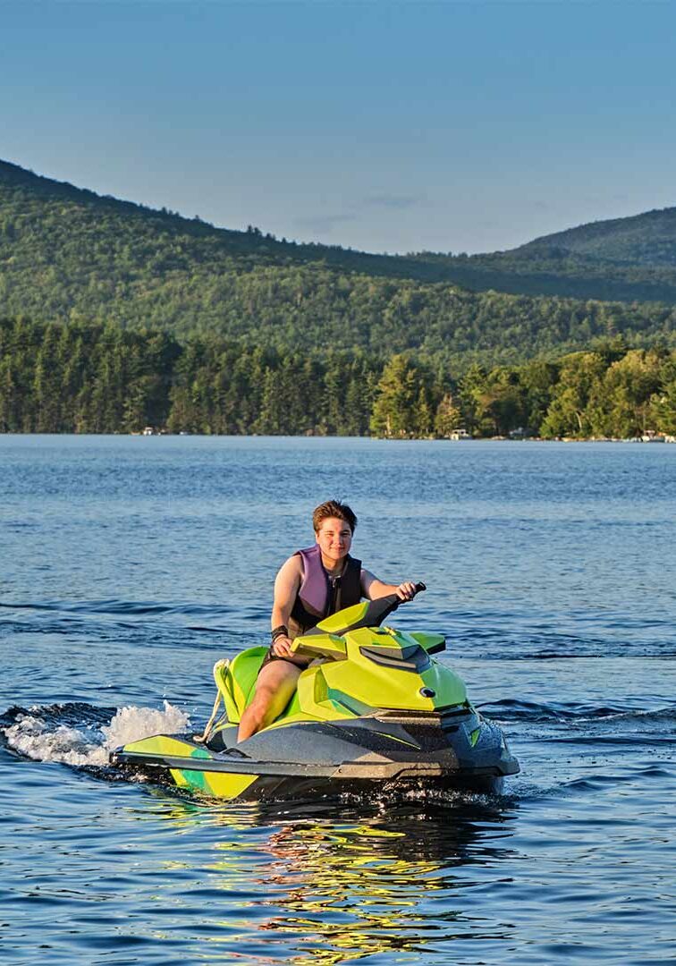 Male on a Sea Doo personal watercraft